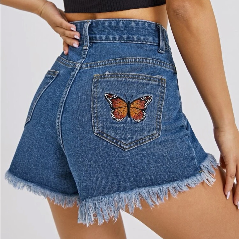 Never worn denim butterfly fringe shorts blue jean